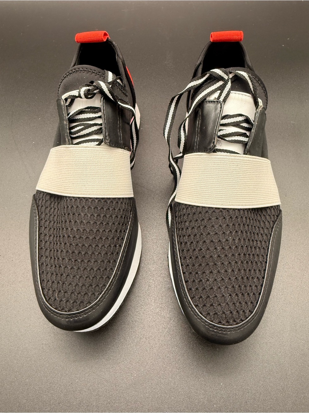Steve Madden Black Mesh Slip-On Sneakers with Cream Strap and Red Heel Tab